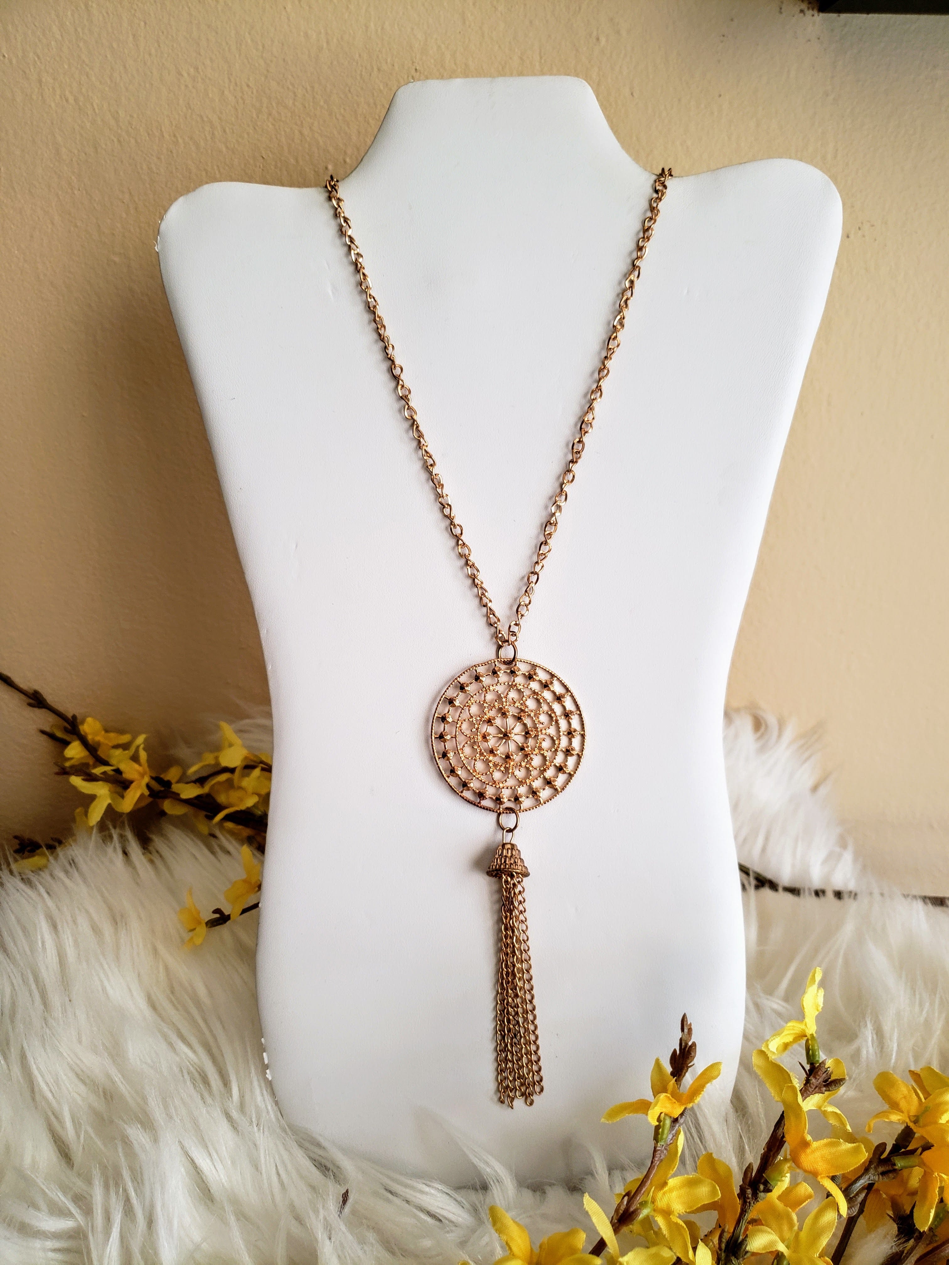 A mandala of the store people brass necklace